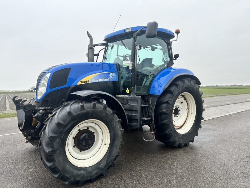 New Holland T6080 - Трактор: снимка 1 New Holland T6080 - Трактор: снимка 1