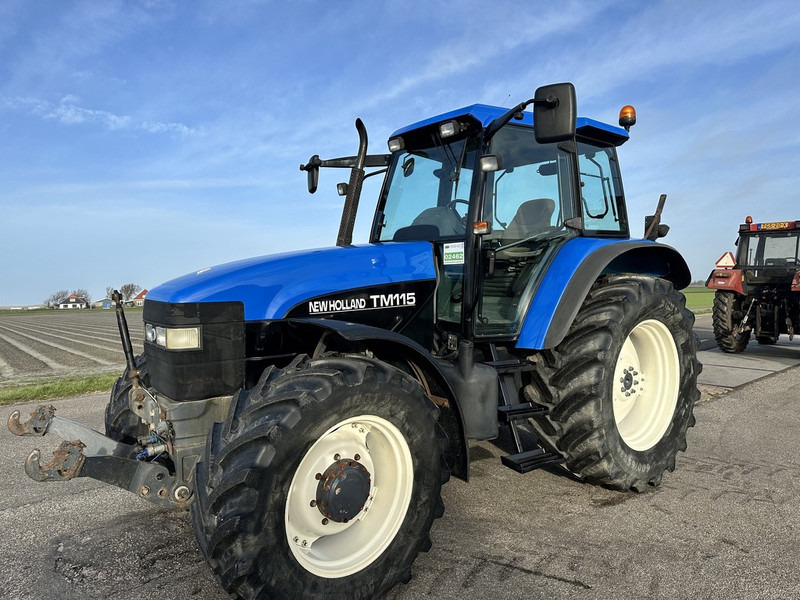 New Holland TM 115 - Трактор: снимка 1 New Holland TM 115 - Трактор: снимка 1