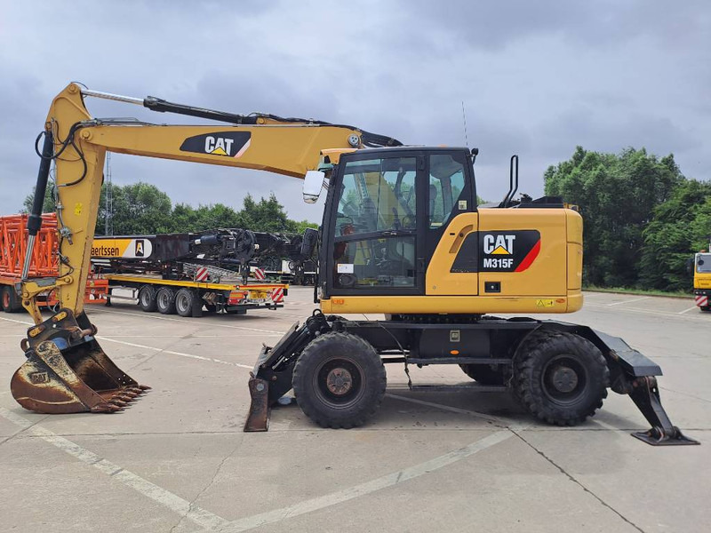 Cat M315F - Колесен багер: снимка 1 Cat M315F - Колесен багер: снимка 1