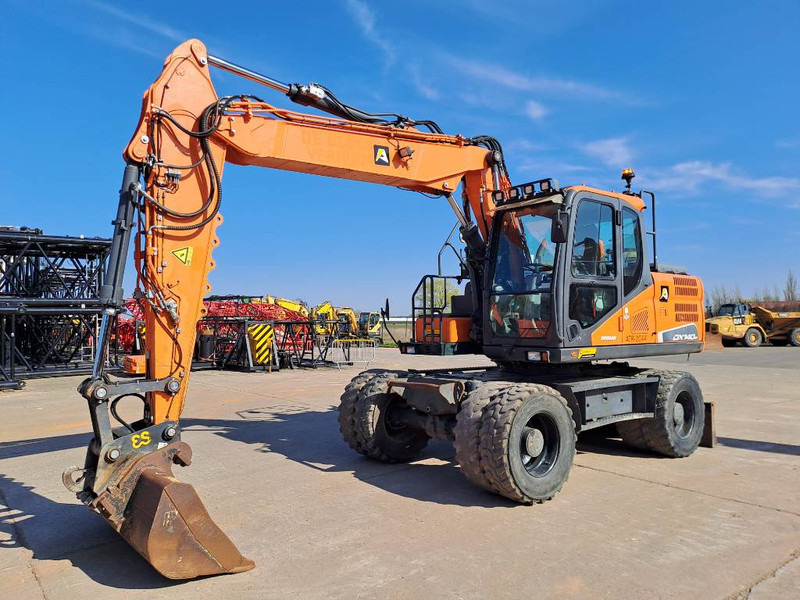 Колесен багер Doosan DX140W-5: снимка 7