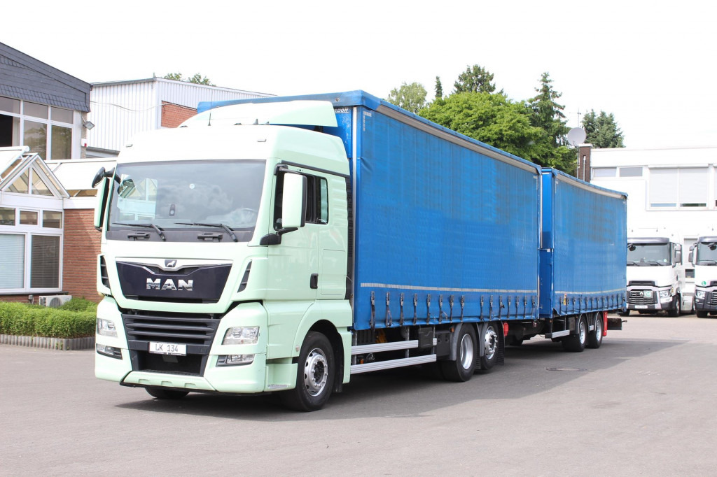 MAN TGX26.460 Durchlad Plane-Jumbo Retarder Hubdach - Камион с брезент: снимка 1 MAN TGX26.460 Durchlad Plane-Jumbo Retarder Hubdach - Камион с брезент: снимка 1
