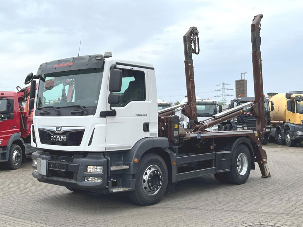 MAN TG-M 18.320 4x2 Absetzkipper Meiller, Funk - Мултилифт за контейнери камион: снимка 1 MAN TG-M 18.320 4x2 Absetzkipper Meiller, Funk - Мултилифт за контейнери камион: снимка 1