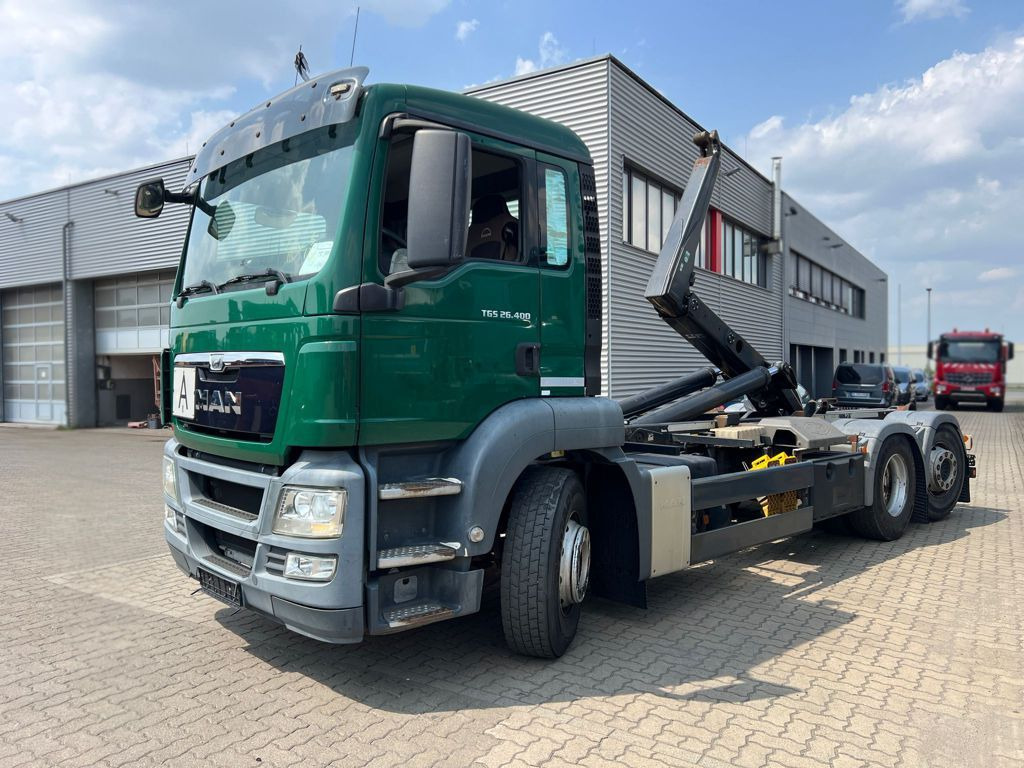 MAN TG-S 26.400 6x2-2 BL Abrollkipper org. nur237TKM - Мултилифт с кука камион: снимка 1 MAN TG-S 26.400 6x2-2 BL Abrollkipper org. nur237TKM - Мултилифт с кука камион: снимка 1