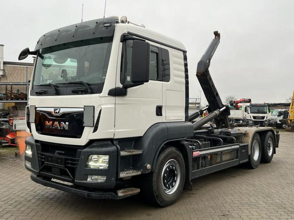 MAN TG-S 26.460 6x2-2 BL Abrollkipper Meiller, Funk - Мултилифт с кука камион: снимка 1 MAN TG-S 26.460 6x2-2 BL Abrollkipper Meiller, Funk - Мултилифт с кука камион: снимка 1