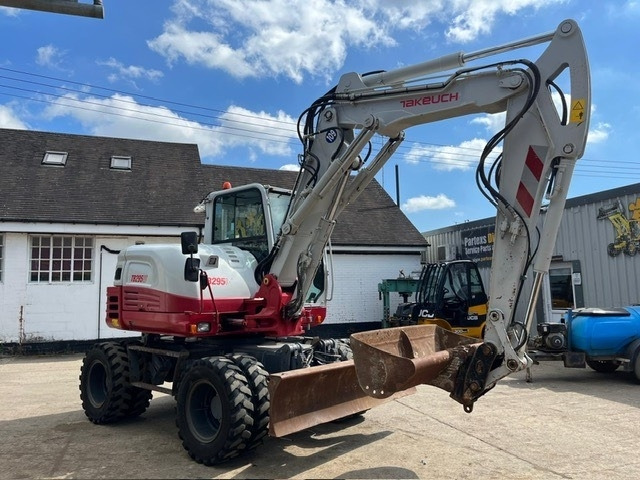 Takeuchi TB295W - Колесен багер: снимка 2 Takeuchi TB295W - Колесен багер: снимка 2