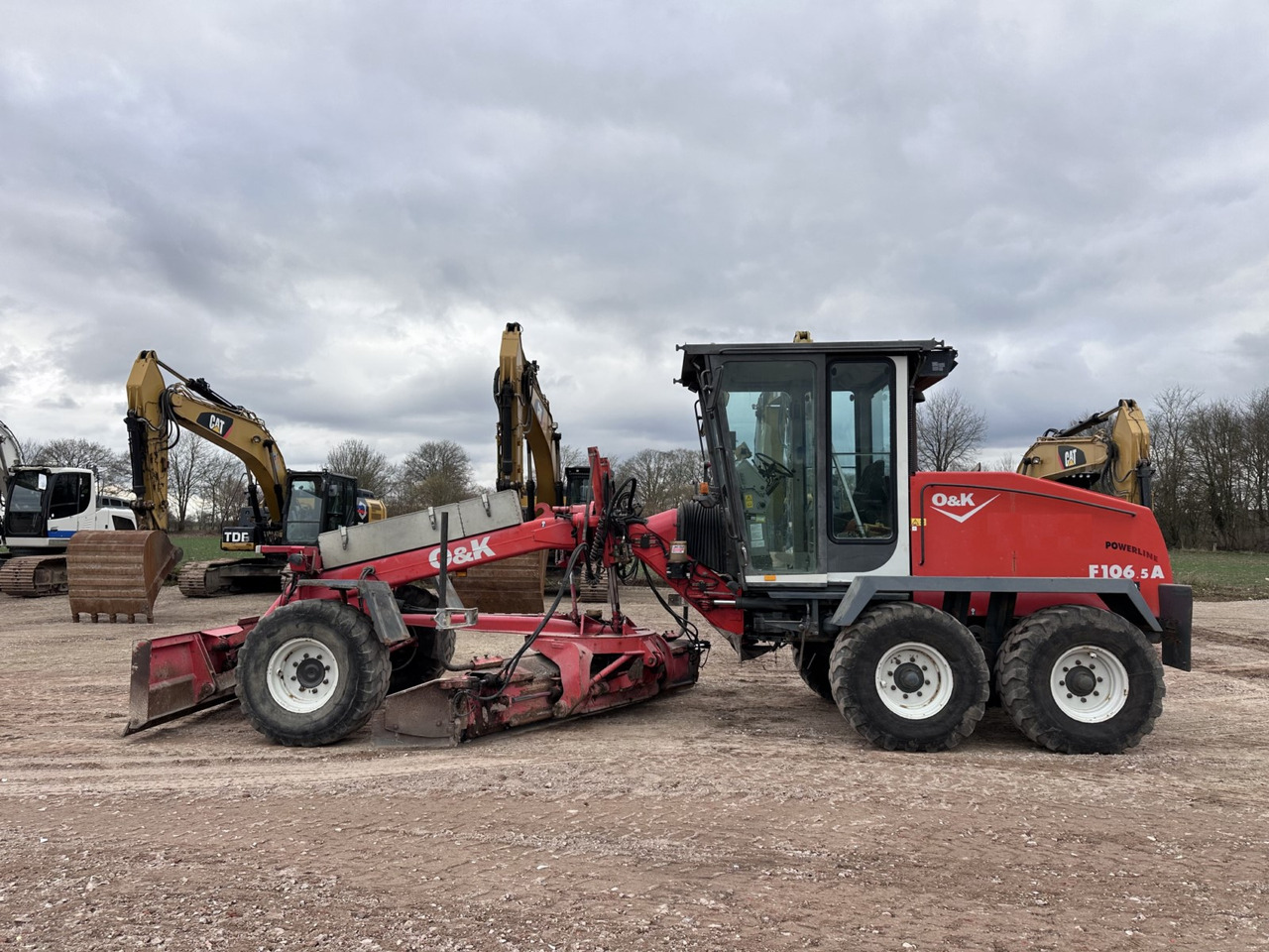 NEW HOLLAND F 106.5 - 6x6 Laser Topcon- Klima Cummins 6 Zyl. - Грейдер: снимка 1 NEW HOLLAND F 106.5 - 6x6 Laser Topcon- Klima Cummins 6 Zyl. - Грейдер: снимка 1