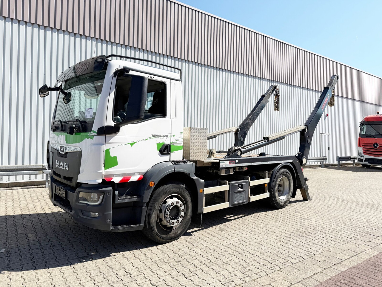 MAN TGM 18.320 4x2 BL TGM 18.320 4x2 BL, Hiab Tele-Absetzanlage, Funk - Мултилифт за контейнери камион: снимка 1 MAN TGM 18.320 4x2 BL TGM 18.320 4x2 BL, Hiab Tele-Absetzanlage, Funk - Мултилифт за контейнери камион: снимка 1