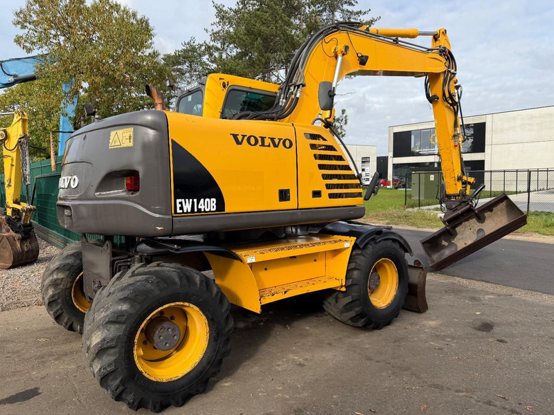 Volvo EW 140 B *FULL HYDR* - BLADE - 10.485h - TILT BUCKET -  CE - NL MACHINE - GOOD CONDITION - Колесен багер: снимка 3 Volvo EW 140 B *FULL HYDR* - BLADE - 10.485h - TILT BUCKET -  CE - NL MACHINE - GOOD CONDITION - Колесен багер: снимка 3