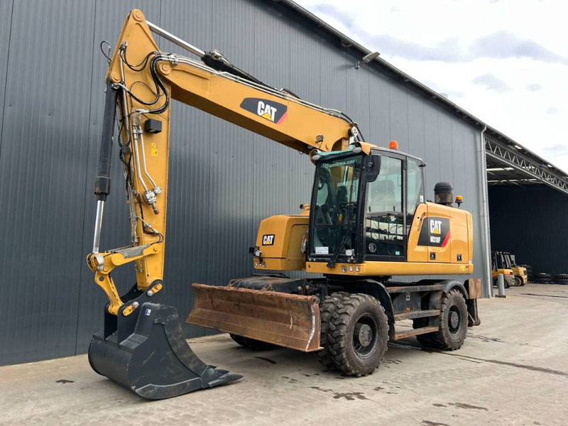 Cat M318F - Колесен багер: снимка 1 Cat M318F - Колесен багер: снимка 1