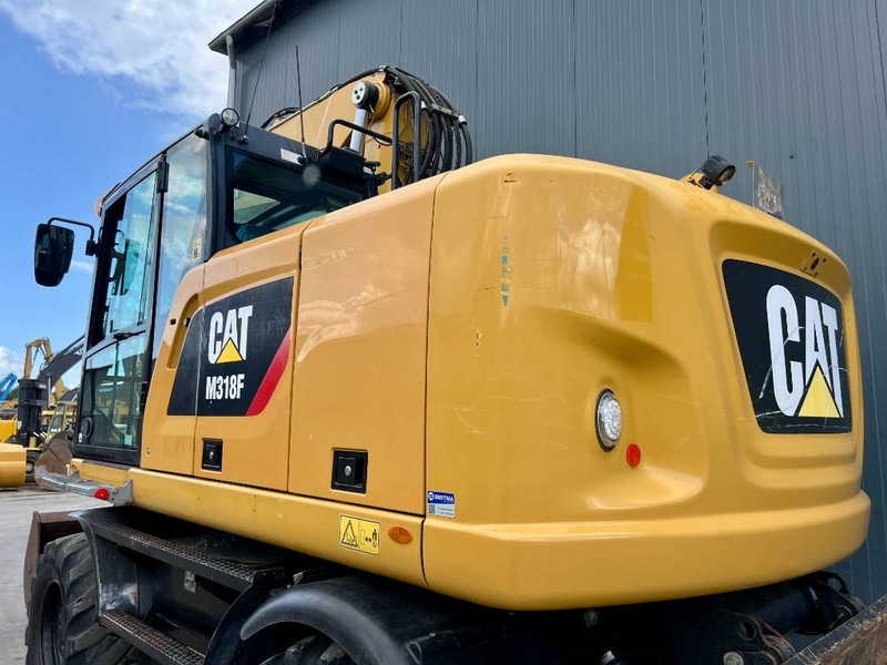Колесен багер Cat M318F: снимка 6