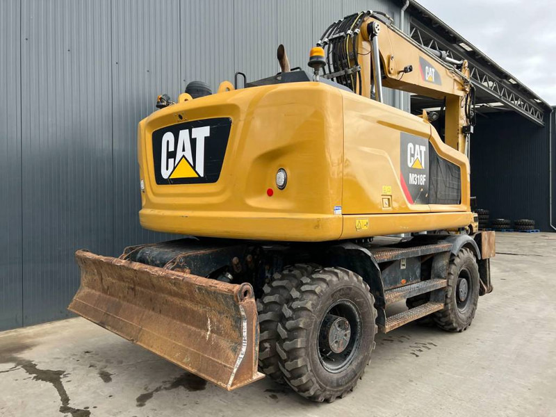 Cat M318F - Колесен багер: снимка 4 Cat M318F - Колесен багер: снимка 4