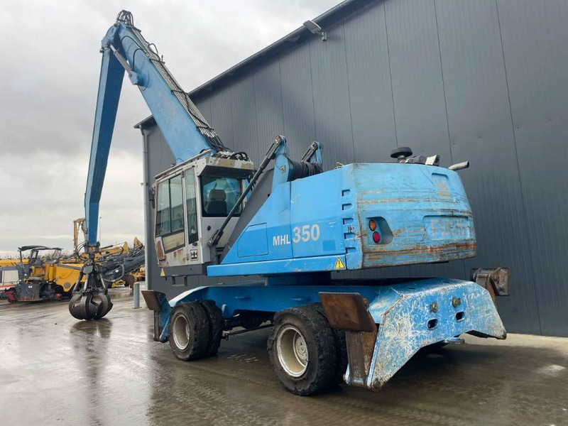 Fuchs MHL350 - Багер за манипулиране на материали: снимка 3 Fuchs MHL350 - Багер за манипулиране на материали: снимка 3