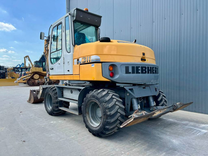 Liebherr A311 Litronic - Колесен багер: снимка 2 Liebherr A311 Litronic - Колесен багер: снимка 2