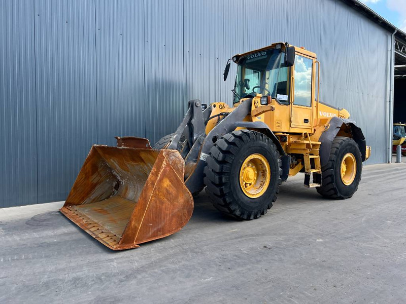 Volvo L60E - Колесен товарач: снимка 1 Volvo L60E - Колесен товарач: снимка 1