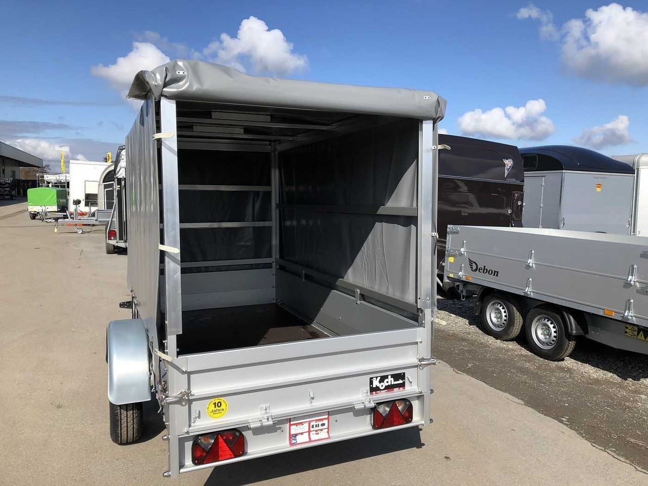 KOCH U4 mit Plane 1100 grau Kastenanhänger ungebremst - Ремарке за кола: снимка 4 KOCH U4 mit Plane 1100 grau Kastenanhänger ungebremst - Ремарке за кола: снимка 4