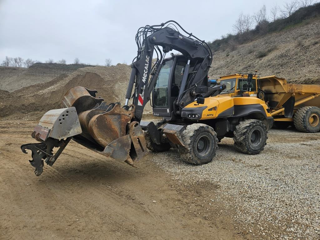 MECALAC 12 MTX - Колесен багер: снимка 1 MECALAC 12 MTX - Колесен багер: снимка 1