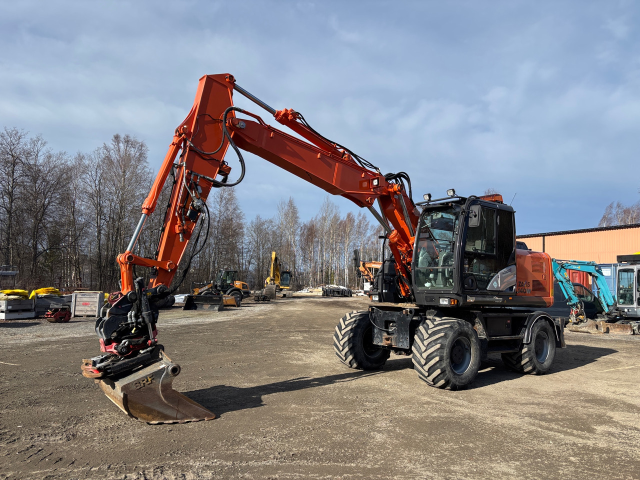 Hitachi ZX140W-5B - Багер: снимка 1 Hitachi ZX140W-5B - Багер: снимка 1