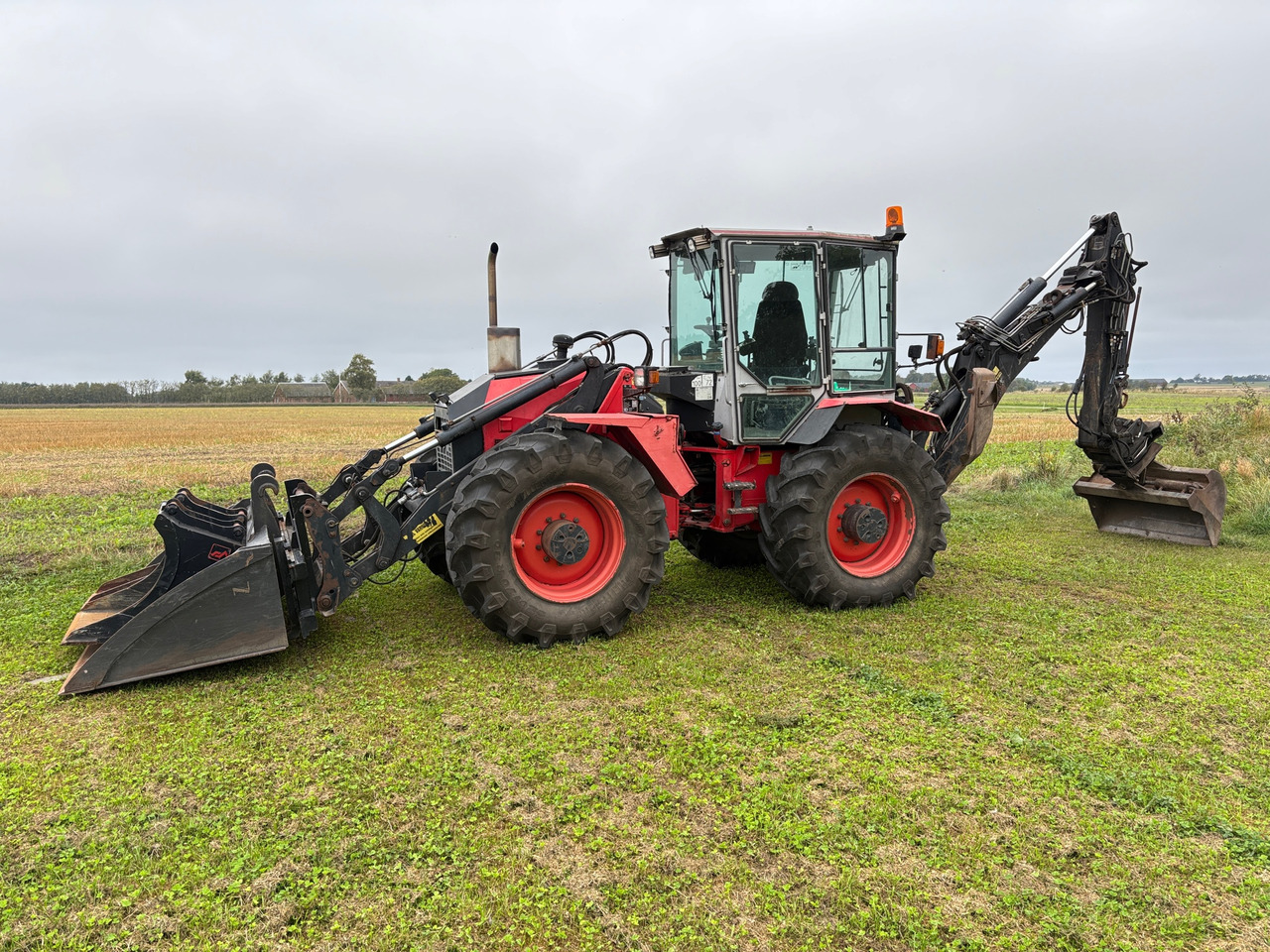 Huddig 860 - Багер-товарач: снимка 1 Huddig 860 - Багер-товарач: снимка 1