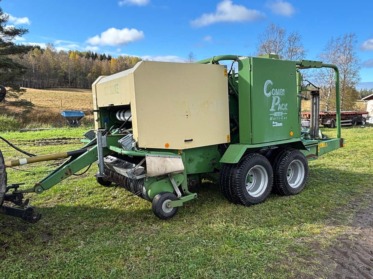 Krone Combi Pack 1250 - Рулонна сламопреса: снимка 1 Krone Combi Pack 1250 - Рулонна сламопреса: снимка 1