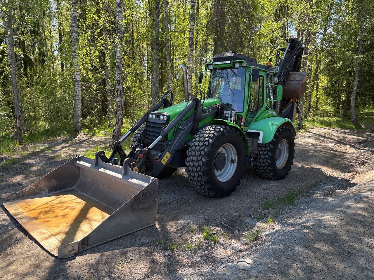 Lännen 860 C - Багер-товарач: снимка 1 Lännen 860 C - Багер-товарач: снимка 1