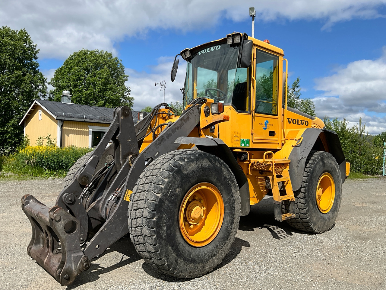 Volvo L60E - Колесен товарач: снимка 1 Volvo L60E - Колесен товарач: снимка 1