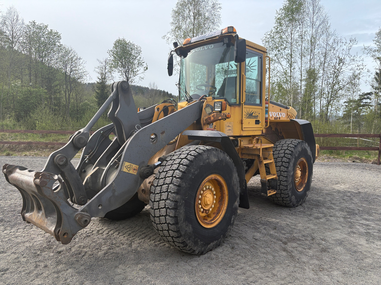Volvo L70E - Колесен товарач: снимка 1 Volvo L70E - Колесен товарач: снимка 1