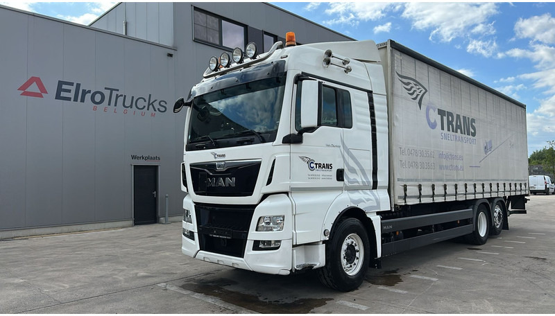 MAN TGX 26.400 (EURO 6 / 6X2 / LIFT / HAYON / BELGIAN TRUCK / GUTE ZUSTAND !! / 8.40 BOX LENGTH) - Камион с брезент: снимка 1 MAN TGX 26.400 (EURO 6 / 6X2 / LIFT / HAYON / BELGIAN TRUCK / GUTE ZUSTAND !! / 8.40 BOX LENGTH) - Камион с брезент: снимка 1