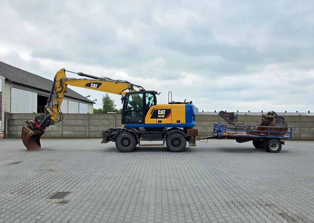 Caterpillar M318F, 2018 ROK, PODPORY + PŁUG, ROTOTILT - Колесен багер: снимка 1 Caterpillar M318F, 2018 ROK, PODPORY + PŁUG, ROTOTILT - Колесен багер: снимка 1