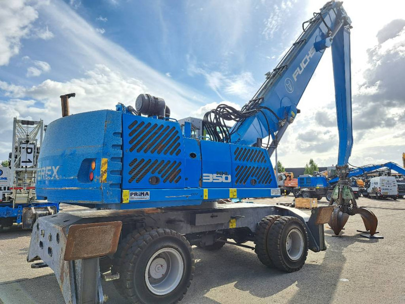 Fuchs MHL 350 E - Багер за манипулиране на материали: снимка 4 Fuchs MHL 350 E - Багер за манипулиране на материали: снимка 4