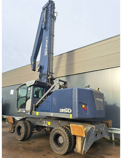 Fuchs MHL 350 F - Багер за манипулиране на материали: снимка 1 Fuchs MHL 350 F - Багер за манипулиране на материали: снимка 1