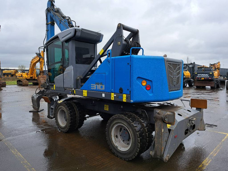 Fuchs MHL310F + Grapple - Багер за манипулиране на материали: снимка 5 Fuchs MHL310F + Grapple - Багер за манипулиране на материали: снимка 5