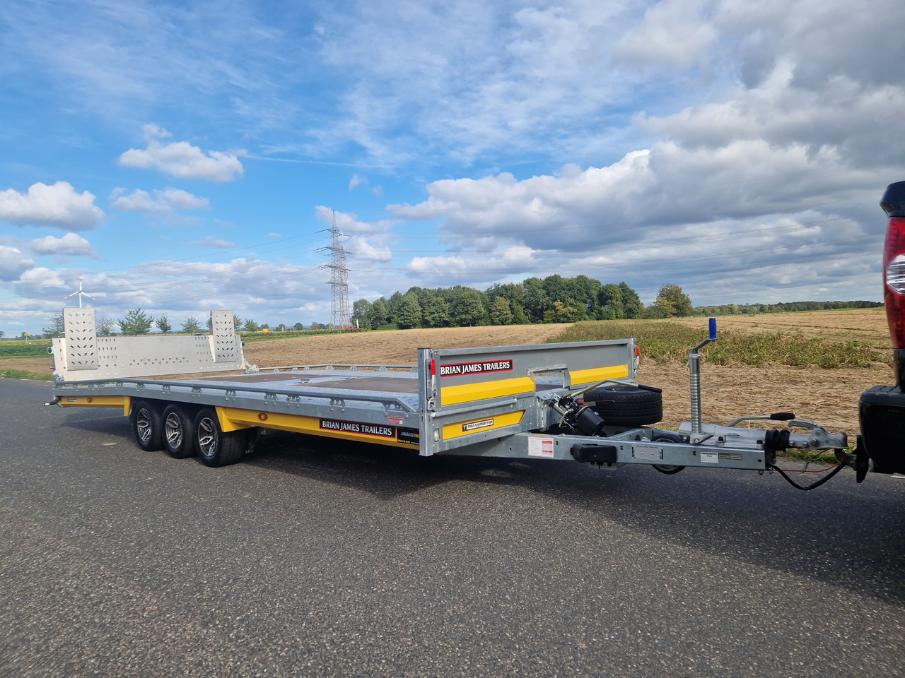 BJT T Transporter 231 550x224cm yellow ankippbar Heckrampe Tridem Alufelgen 10" 3500kg - Автовоз ремарке: снимка 3 BJT T Transporter 231 550x224cm yellow ankippbar Heckrampe Tridem Alufelgen 10" 3500kg - Автовоз ремарке: снимка 3