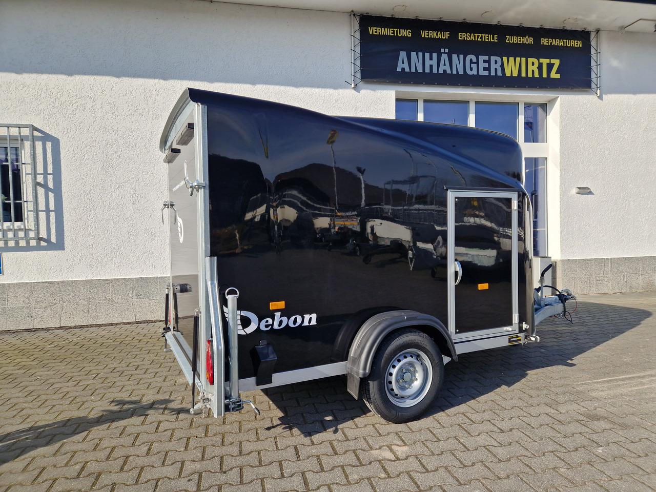Debon Cargo 1300 300x152x168cm black Seitentür aerodynamik Pullman II 100km/H 1300kg Februar Aktion - Затворена каросерия ремарке: снимка 4 Debon Cargo 1300 300x152x168cm black Seitentür aerodynamik Pullman II 100km/H 1300kg Februar Aktion - Затворена каросерия ремарке: снимка 4