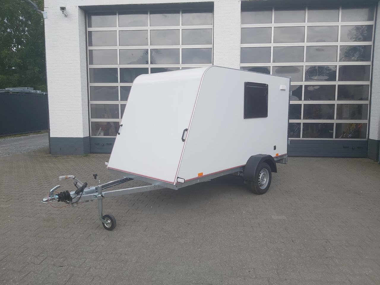 Лизинг на  Kargo Camp TFS S Midi 320x150x150cm aero Seitentür Fenster Strom 230V (S) 750kg gebremst Modell 22 Kargo Camp TFS S Midi 320x150x150cm aero Seitentür Fenster Strom 230V (S) 750kg gebremst Modell 22: снимка 13