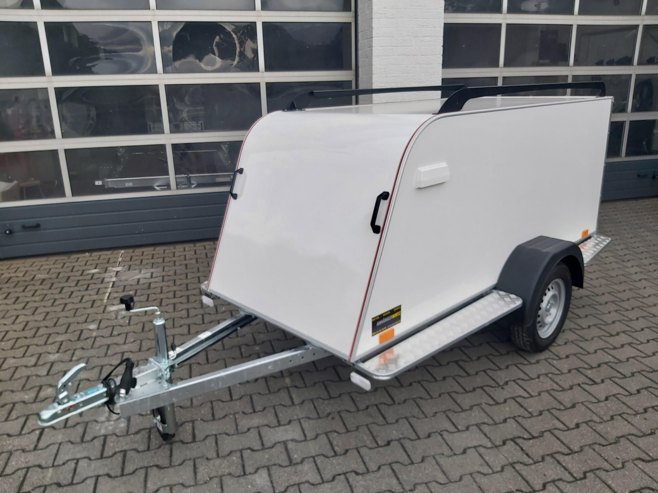 Kofferanhänger TF4 S Midi 250x110x90cm aerodynamisch Trittbretter Dachreling (S) 100km/H 750kg - Затворена каросерия ремарке: снимка 1 Kofferanhänger TF4 S Midi 250x110x90cm aerodynamisch Trittbretter Dachreling (S) 100km/H 750kg - Затворена каросерия ремарке: снимка 1