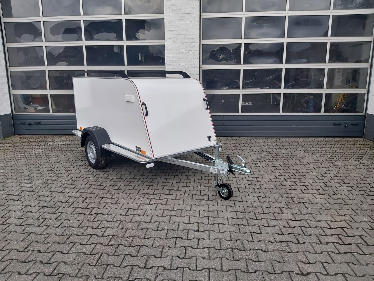 Kofferanhänger TF4 S Midi 250x110x90cm aerodynamisch Trittbretter Dachreling (S) 100km/H 750kg - Затворена каросерия ремарке: снимка 5 Kofferanhänger TF4 S Midi 250x110x90cm aerodynamisch Trittbretter Dachreling (S) 100km/H 750kg - Затворена каросерия ремарке: снимка 5