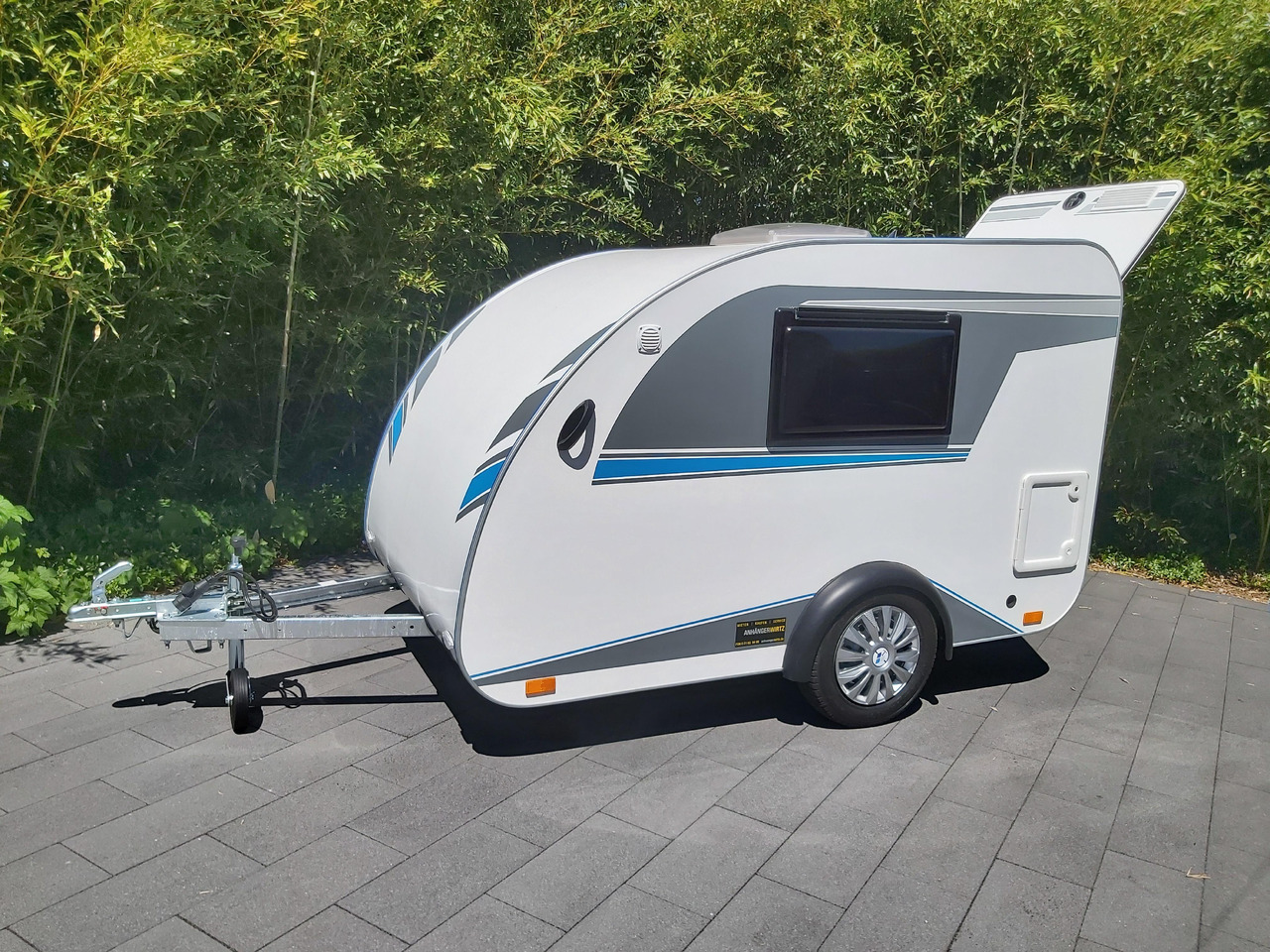 Mini Camper Mini Tommy TMC25 Basic V1 252x140x121cm Küche 100km/H 750kg ohne Bremse Winter Aktion - Каравана: снимка 2 Mini Camper Mini Tommy TMC25 Basic V1 252x140x121cm Küche 100km/H 750kg ohne Bremse Winter Aktion - Каравана: снимка 2