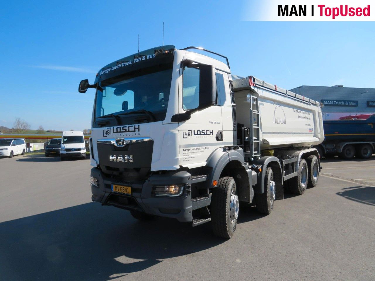 MAN TGS 41.480 8x4 BB CH Schmitz Muldenkipper - Мултилифт за контейнери камион: снимка 2 MAN TGS 41.480 8x4 BB CH Schmitz Muldenkipper - Мултилифт за контейнери камион: снимка 2
