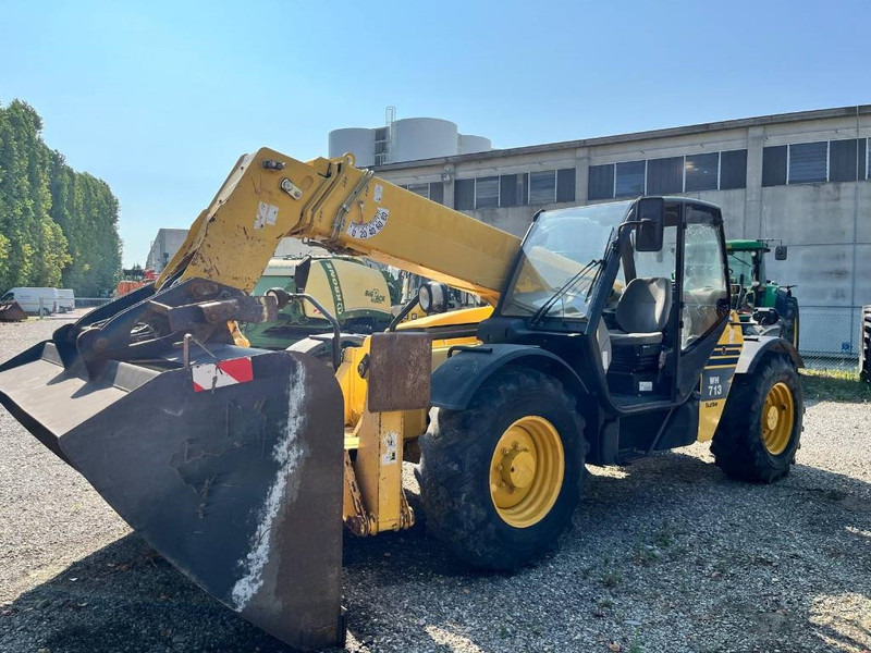 Komatsu WH 713 - Телескопичен товарач: снимка 3 Komatsu WH 713 - Телескопичен товарач: снимка 3