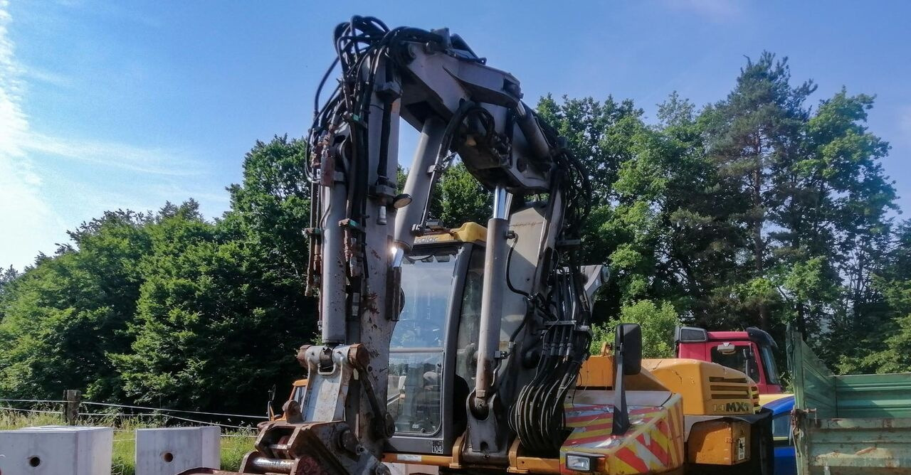 Mecalac 14 MXT - Колесен багер: снимка 1 Mecalac 14 MXT - Колесен багер: снимка 1