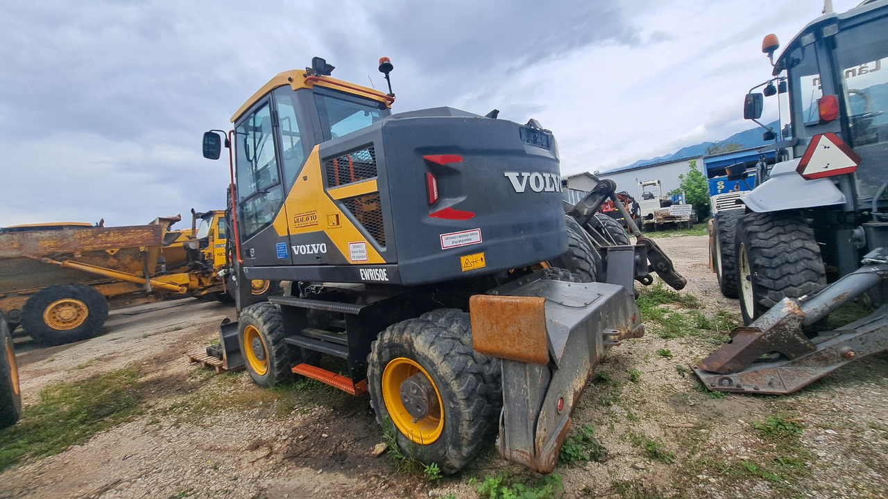 VOLVO EWR150E - Колесен багер: снимка 1 VOLVO EWR150E - Колесен багер: снимка 1