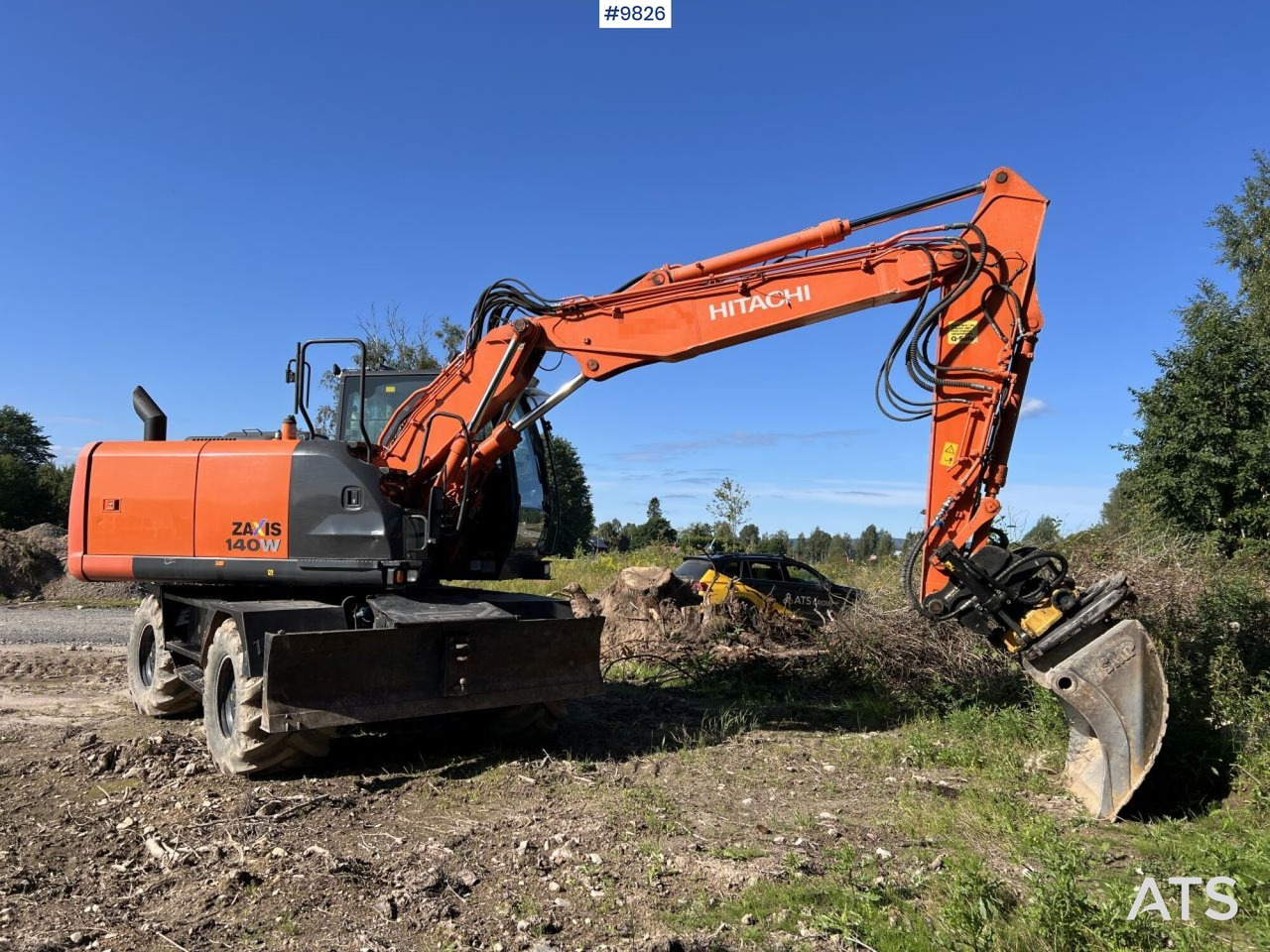 Hitachi ZX140 W-5B with rotor and planer bucket - Колесен багер: снимка 1 Hitachi ZX140 W-5B with rotor and planer bucket - Колесен багер: снимка 1