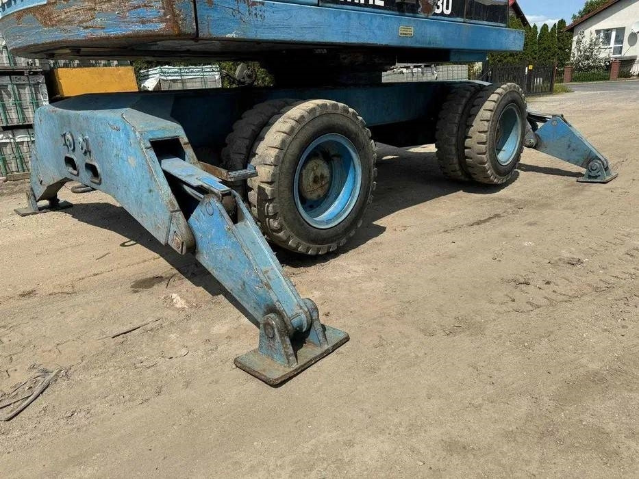 Koparka przeładunkowa Fuchs MHL 330 - Багер за манипулиране на материали: снимка 4 Koparka przeładunkowa Fuchs MHL 330 - Багер за манипулиране на материали: снимка 4