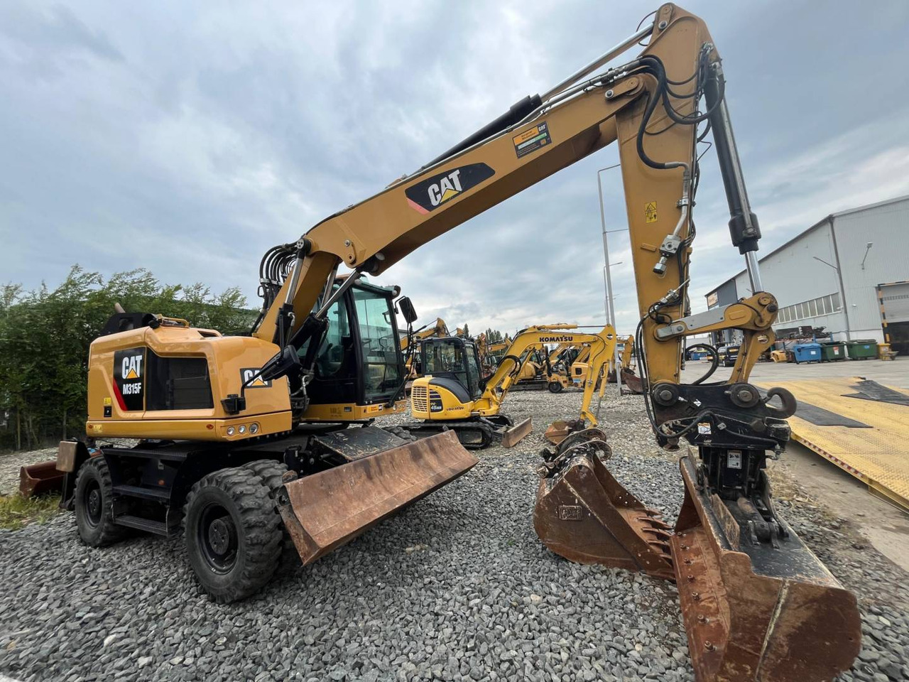 CAT M315F - Колесен багер: снимка 2 CAT M315F - Колесен багер: снимка 2