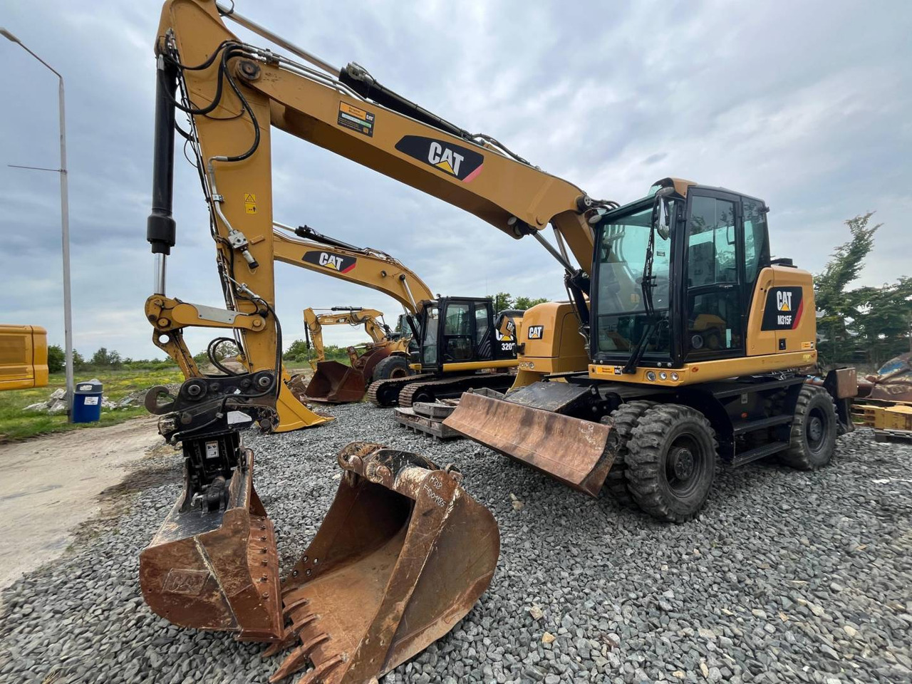 CAT M315F - Колесен багер: снимка 1 CAT M315F - Колесен багер: снимка 1