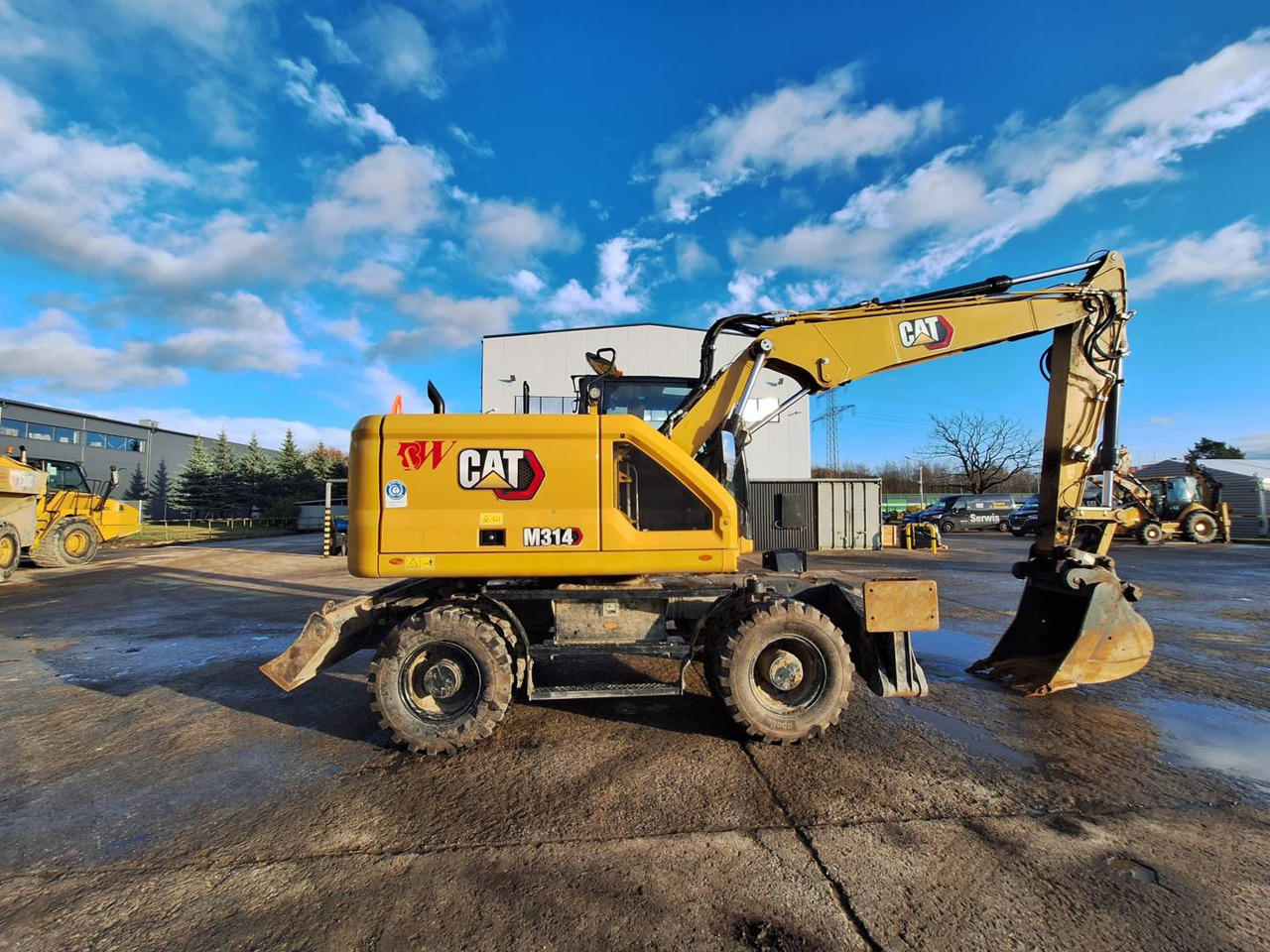 Колесен багер CAT M 314: снимка 10