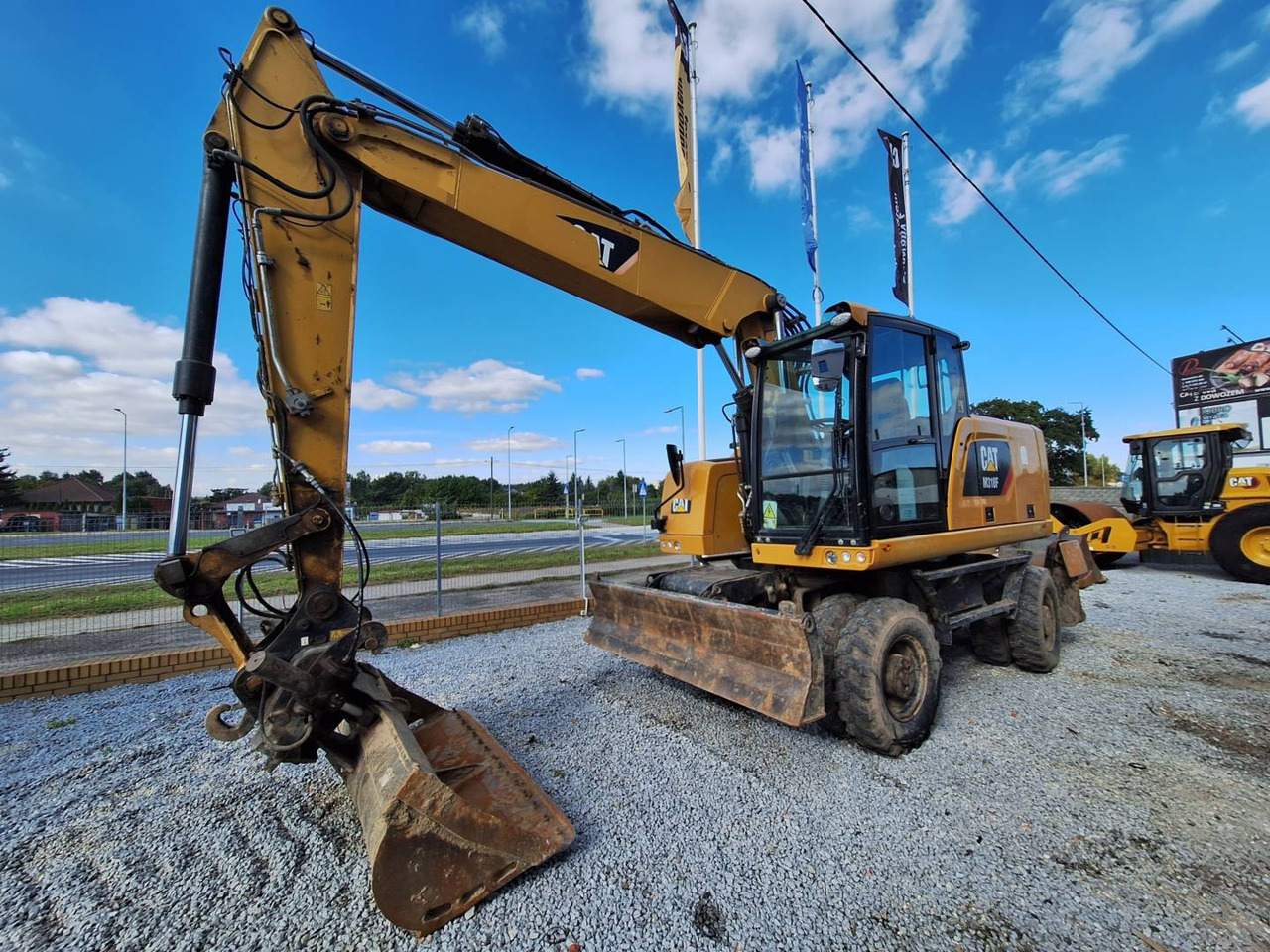 CAT M318F - Колесен багер: снимка 1 CAT M318F - Колесен багер: снимка 1