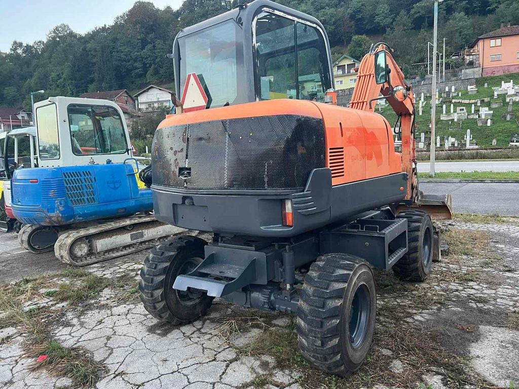 Doosan S55W-V Plus, 4800hours - Колесен багер: снимка 4 Doosan S55W-V Plus, 4800hours - Колесен багер: снимка 4