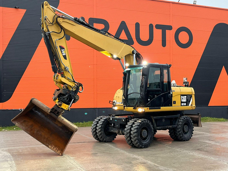 Caterpillar M316D / ROTOTILT/ AC / CENTRAL LUBRICATION / + EXTRA BUCKET - Колесен багер: снимка 1 Caterpillar M316D / ROTOTILT/ AC / CENTRAL LUBRICATION / + EXTRA BUCKET - Колесен багер: снимка 1