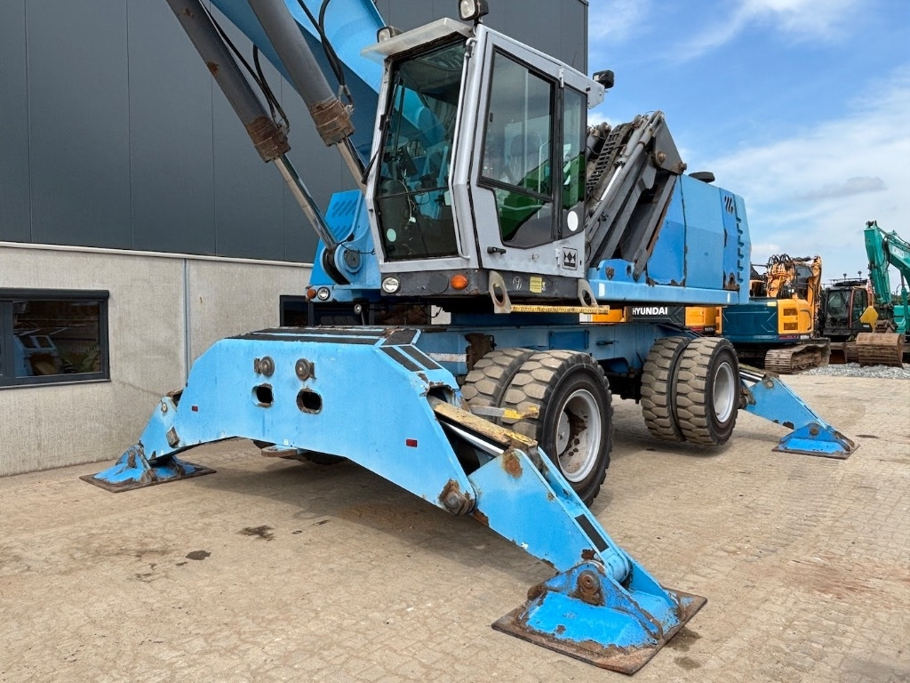 Fuchs MHL 380 - Багер за манипулиране на материали: снимка 4 Fuchs MHL 380 - Багер за манипулиране на материали: снимка 4